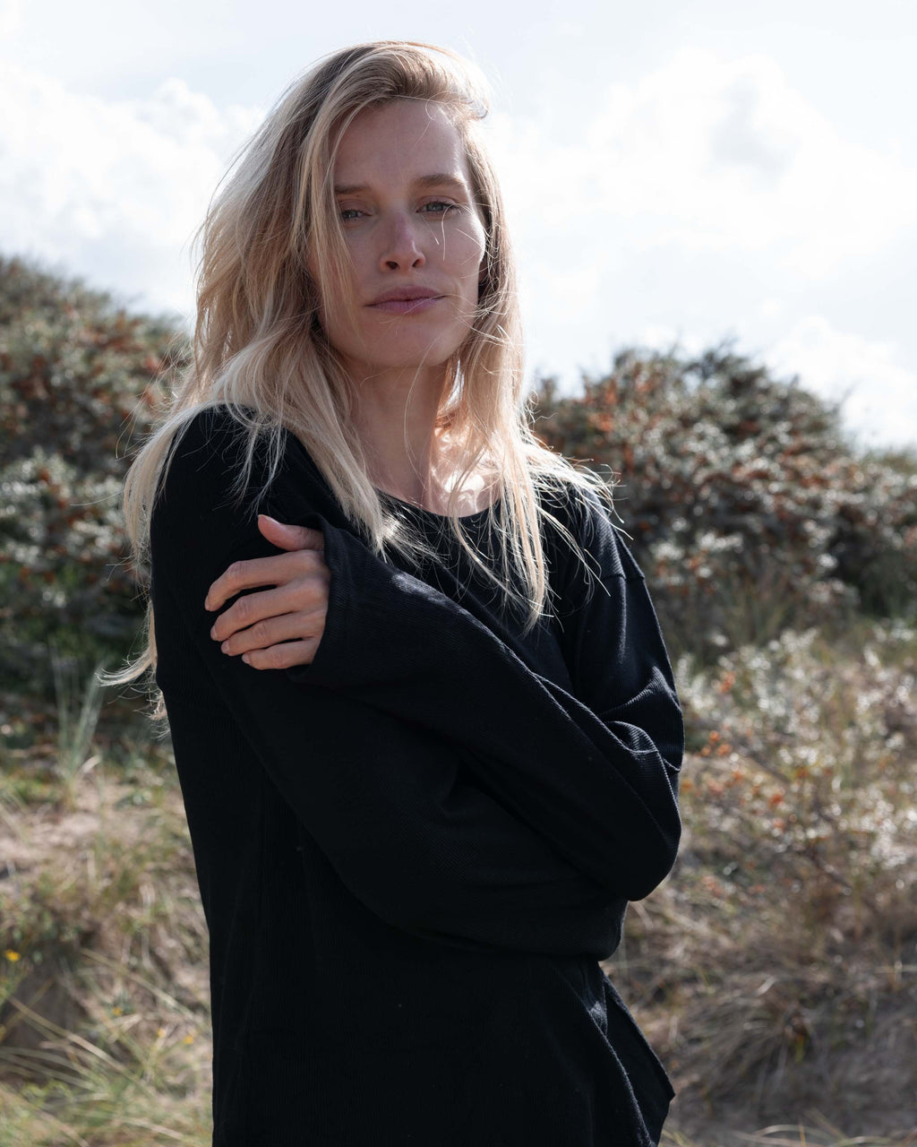 Mari relaxed-fit long-sleeved wool top - black