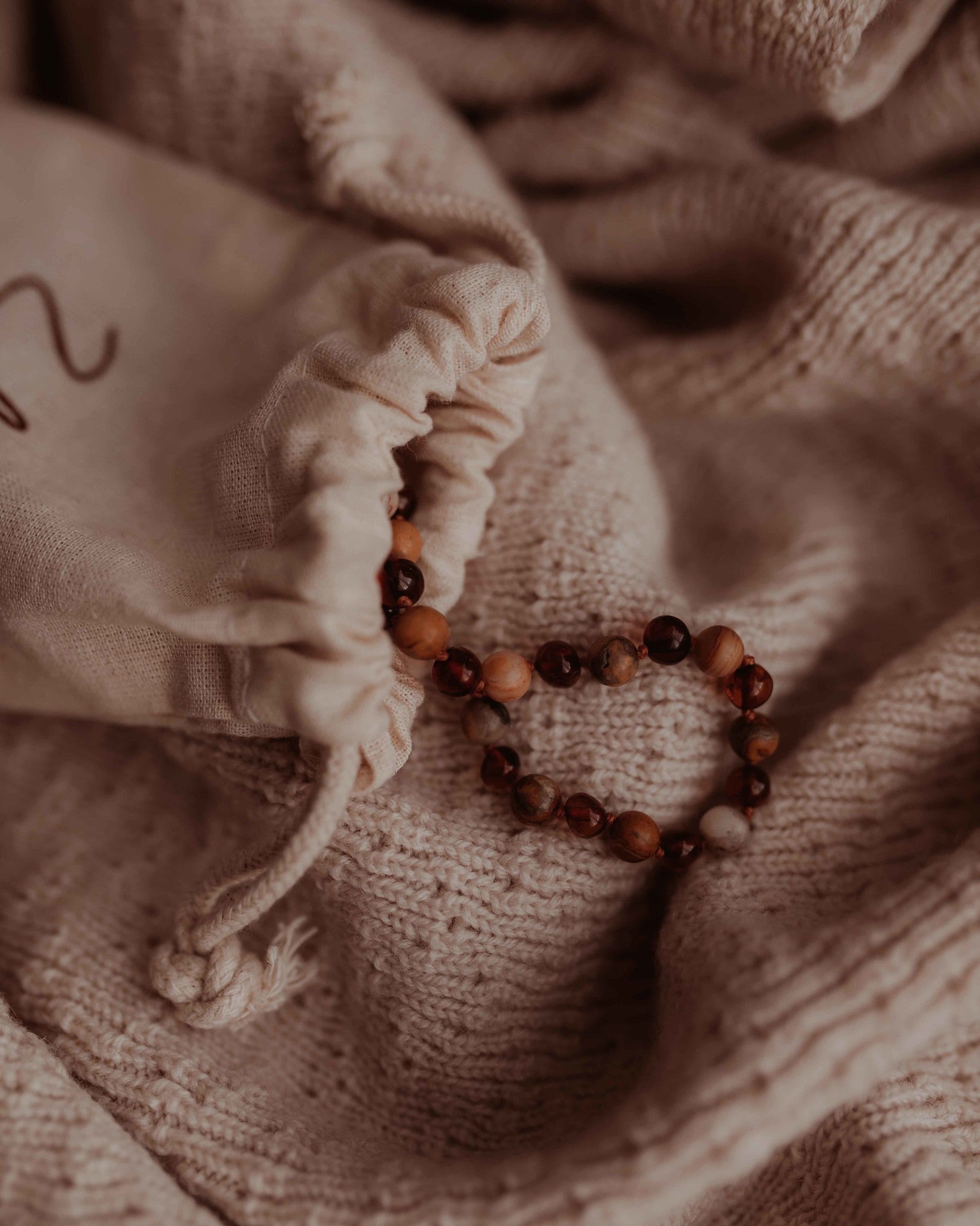 Amber barnsteen ketting zakje cognac agaat