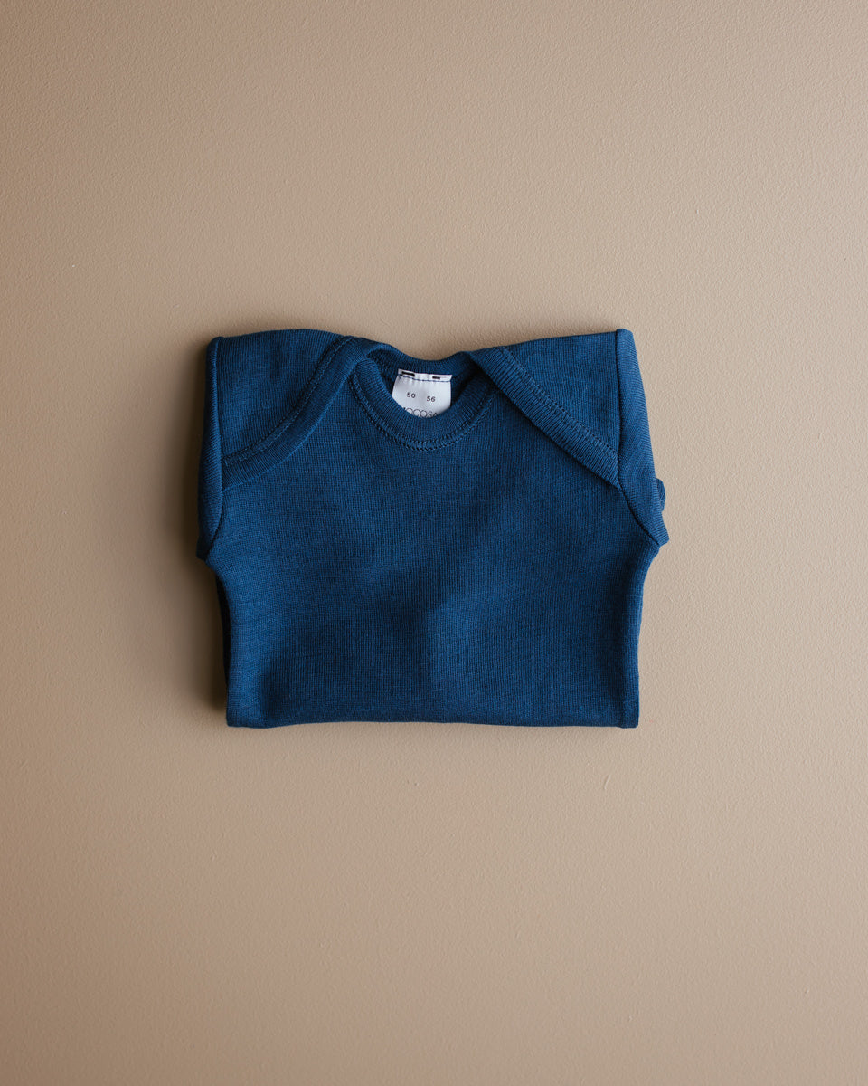 Hocosa woolen baby body navy copyright Ziloen