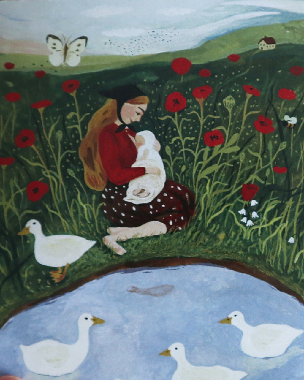 Tijana draws breastfeeding in poppy field