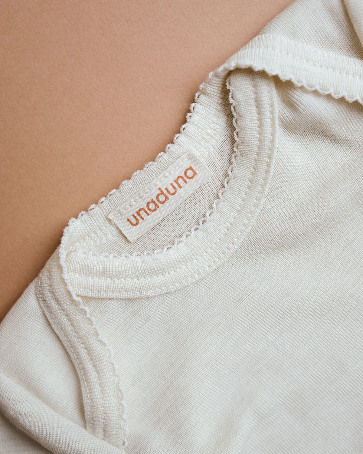 unaduna_body_crochet_edge_longsleeves_natural_baby_